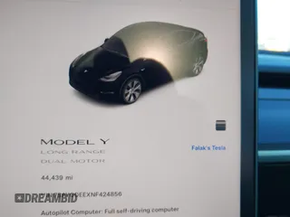 2022 Tesla Model Y Long Range with VIN 7SAYGDEEXNF424856, listed as a IAAI auction lot 41059718 with 44,439 mi miles and . Bid and sale history available at carsss.com. Image 19.