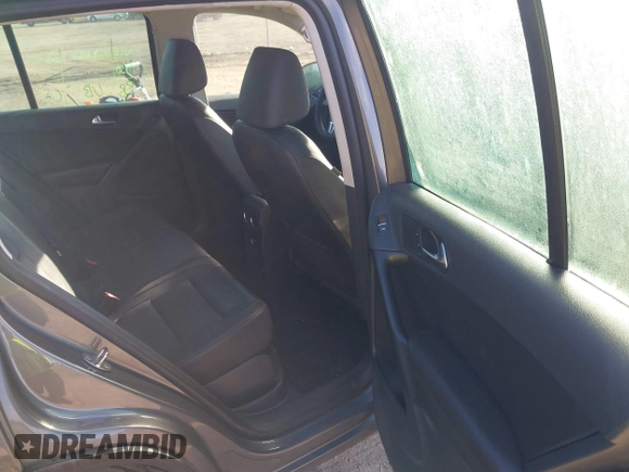 2012 Volkswagen Tiguan SEL with VIN WVGAV7AX2CW000962, listed as a IAAI auction lot 40815475 with 162,859 mi miles and . Bid and sale history available at DreamBid. Image 8.