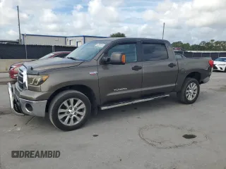 2012 Toyota Tundra z VIN 5TFDW5F14CX216264, wystawiony jako Copart lot #60983285 z przebiegiem 186 869 mil mil oraz Szkoda całkowita • Salvage title. Historia ofert i sprzedaży dostępna na DreamBid. Obrazek 1.