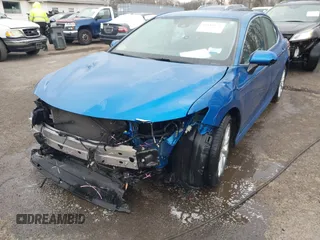 2020 Toyota Camry LE with VIN 4T1C11AK7LU324006, listed as a IAAI auction lot 41486878 with 76,290 mi miles. Bid and sale history available at carsss.com. Image 6.