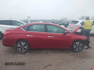 2019 Nissan Sentra S z VIN 3N1AB7AP7KY256134, wystawiony jako IAAI lot #41512289 z przebiegiem Nie podano mil oraz . Historia ofert i sprzedaży dostępna na DreamBid. Obrazek 14.