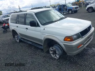 1998 Mitsubishi Montero Sport LS with VIN JA4MT31P3WP025054, listed as a IAAI auction lot 41880704 with 381,966 mi miles. Bid and sale history available at carsss.com. Image 1.