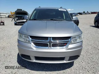 2017 Dodge Journey SXT with VIN 3C4PDDBG3HT591993, listed as a Copart auction lot 58241065 with 161,964 mi miles and Salvage title. Bid and sale history available at DreamBid. Image 5.