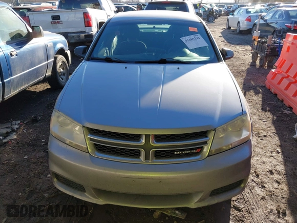 2013 Dodge Avenger SE with VIN 1C3CDZAB4DN590562, listed as a IAAI auction lot 41689241 with 258,167 mi miles and . Bid and sale history available at carsss.com. Image 12.