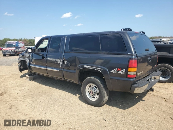 2005 GMC Sierra 2500HD SLT with VIN 1GTHK292X5E141116, listed as a Copart auction lot 61093415 with 160,630 mi miles and Salvage title. Bid and sale history available at DreamBid. Image 2.