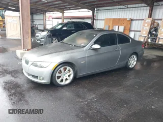 2007 BMW 3 Series 335i with VIN WBAWB73507P035348, listed as a IAAI auction lot 41957831 with 156,943 mi miles and . Bid and sale history available at DreamBid. Image 2.