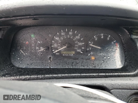 2000 Toyota Camry CE z VIN JT2BG22K7Y0479410, wystawiony jako Copart lot #57871825 z przebiegiem 222 941 mil mil oraz Czysty tytuł • Clean title. Historia ofert i sprzedaży dostępna na DreamBid. Obrazek 9.