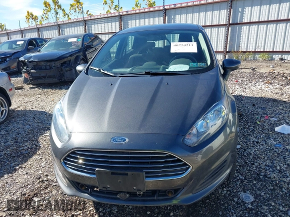 2019 Ford Fiesta SE with VIN 3FADP4EJ7KM138162, listed as a IAAI auction lot 40754211 with 51,886 mi miles. Bid and sale history available at carsss.com. Image 12.