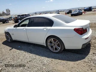 2014 BMW 7 Series 740Li with VIN WBAYE4C57ED137727, listed as a Copart auction lot 51847244 with 136,495 mi miles and Salvage Title. Bid and sale history available at carsss.com. Image 2.