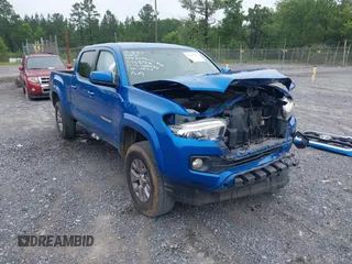 2017 Toyota Tacoma SR5 with VIN 5TFBZ5DN6HX002694, listed as a IAAI auction lot 42344701 with 104,447 mi miles and . Bid and sale history available at DreamBid. Image 1.