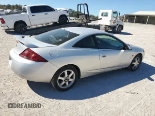 2000 Mercury Cougar z VIN 1ZWFT61L4Y5641222, wystawiony jako Copart lot #75313314 z przebiegiem 138 909 mil mil oraz Szkody całkowita. Historia ofert i sprzedaży dostępna na DreamBid. Obrazek 3.