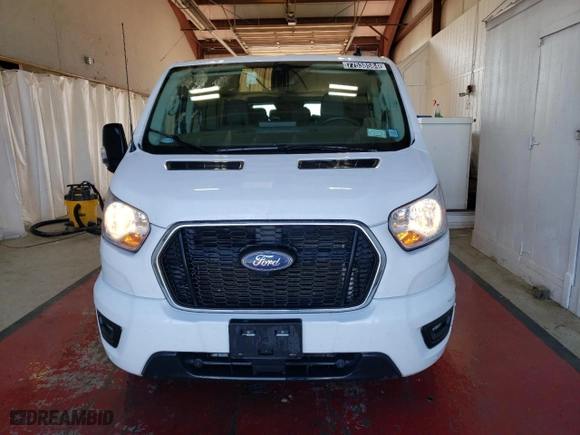 2022 Ford Transit Passenger Wagon XL with VIN 1FBAX2Y86NKA84220, listed as a Copart auction lot 77538584 with 59,071 mi miles and Clean Title. Bid and sale history available at carsss.com. Image 5.