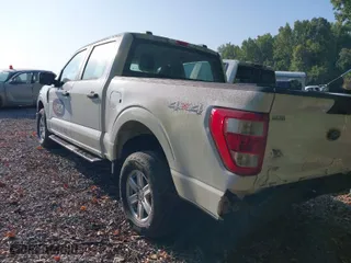 2021 Ford F-150 XL with VIN 1FTEW1EP7MKE32689, listed as a IAAI auction lot 35583709 with 33,070 mi miles. Bid and sale history available at carsss.com. Image 3.