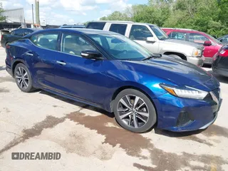 2020 Nissan Maxima SV z VIN 1N4AA6CV0LC381465, wystawiony jako IAAI lot #42166482 z przebiegiem 107 350 mil mil oraz . Historia ofert i sprzedaży dostępna na DreamBid. Obrazek 1.