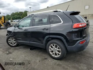 2014 Jeep Cherokee Latitude with VIN 1C4PJMCS2EW260064, listed as a Copart auction lot 64789614 with 201,358 mi miles and Salvage Title. Bid and sale history available at carsss.com. Image 2.