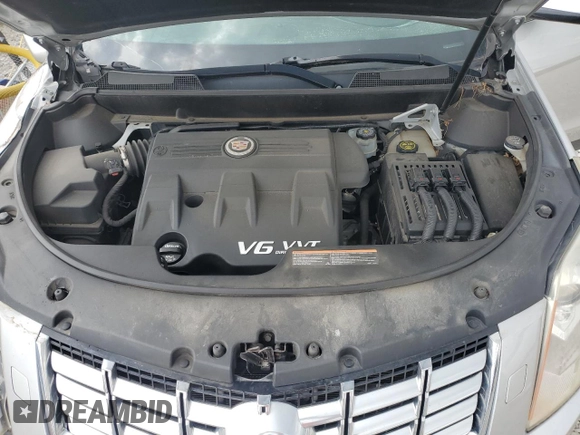 2013 Cadillac SRX Performance Collection z VIN 3GYFNHE3XDS622157, wystawiony jako Copart lot #53475675 z przebiegiem 95 253 mil mil oraz Szkoda całkowita • Salvage title. Historia ofert i sprzedaży dostępna na DreamBid. Obrazek 12.