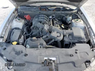 2012 Ford Mustang Premium z VIN 1ZVBP8AM7C5285563, wystawiony jako Copart lot #60732815 z przebiegiem 134 923 mil mil oraz Szkoda całkowita • Salvage title. Historia ofert i sprzedaży dostępna na DreamBid. Obrazek 11.