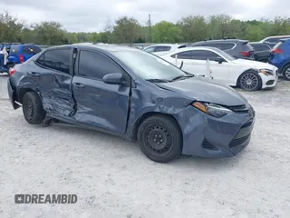 2019 Toyota Corolla L z VIN 5YFBURHE1KP947817, wystawiony jako IAAI lot #41959566 z przebiegiem 128 574 mil mil oraz . Historia ofert i sprzedaży dostępna na DreamBid. Obrazek 1.