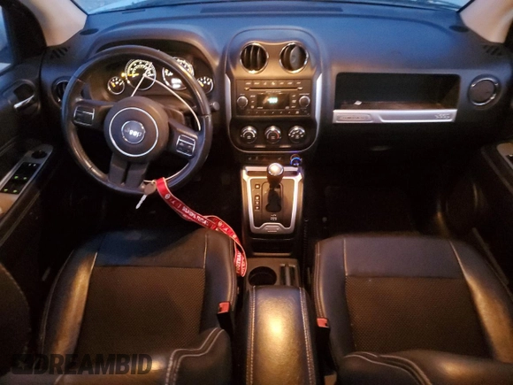 2014 Jeep Compass Latitude with VIN 1C4NJCEB0ED708098, listed as a Copart auction lot 81561334 with 105,687 mi miles and Salvage Title. Bid and sale history available at carsss.com. Image 8.