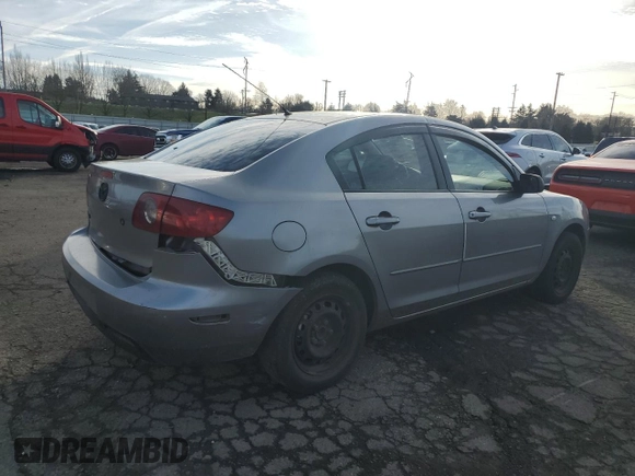 2005 Mazda 3 i with VIN JM1BK12F751242280, listed as a Copart auction lot 84316214 with 222,131 mi miles and Salvage Title. Bid and sale history available at DreamBid. Image 3.