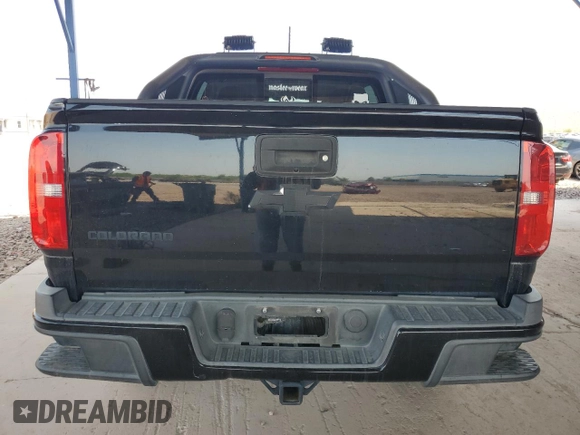 2016 Chevrolet Colorado 4WD Z71 with VIN 1GCGTDE33G1201251, listed as a Copart auction lot 64518695 with 123,602 mi miles and Salvage title. Bid and sale history available at DreamBid. Image 6.