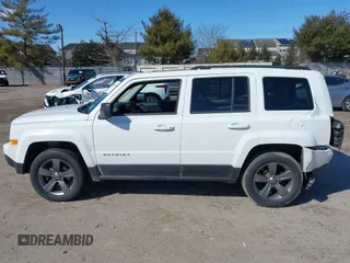 2015 Jeep Patriot High Altitude with VIN 1C4NJRFB8FD270157, listed as a IAAI auction lot 41634010 with 87,662 mi miles and . Bid and sale history available at carsss.com. Image 14.
