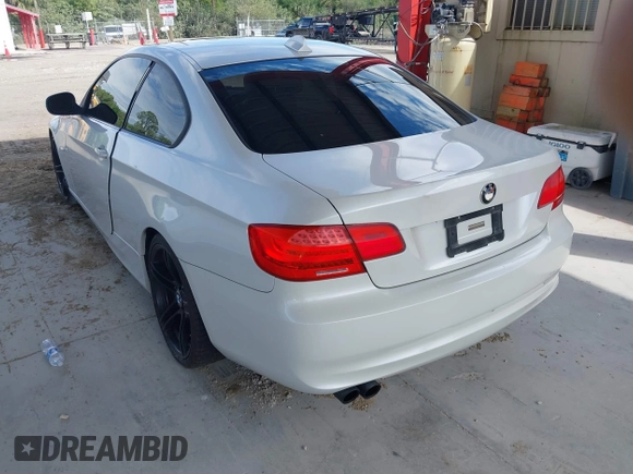2011 BMW 3 Series 328i with VIN WBAKE3C53BE557457, listed as a IAAI auction lot 41631581 with 112,272 mi miles and . Bid and sale history available at carsss.com. Image 3.