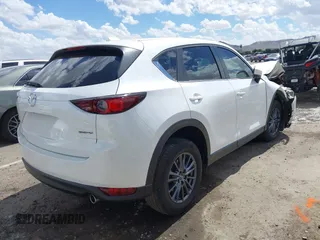 2020 Mazda CX-5 Sport with VIN JM3KFABM1L1752583, listed as a IAAI auction lot 40349125 with 50,134 mi miles. Bid and sale history available at carsss.com. Image 4.