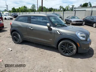 2013 MINI Paceman S ALL4 z VIN WMWSS7C56DWN71592, wystawiony jako Copart lot #57628475 z przebiegiem 83 488 mil mil oraz Szkoda całkowita • Salvage title. Historia ofert i sprzedaży dostępna na DreamBid. Obrazek 4.