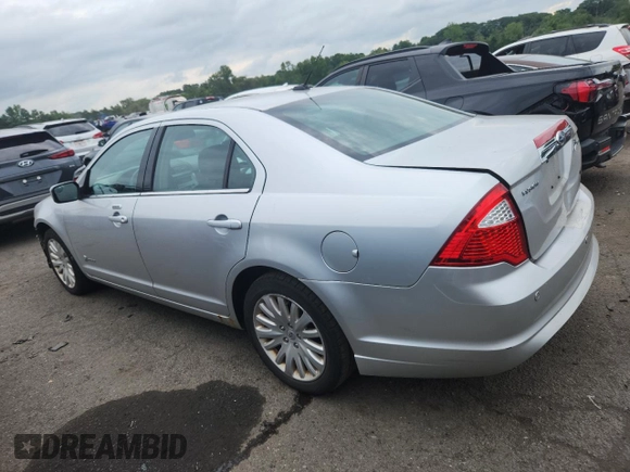 2012 Ford Fusion Hybrid z VIN 3FADP0L34CR227740, wystawiony jako Copart lot #64989475 z przebiegiem 134 862 mil mil oraz Szkoda całkowita • Salvage title. Historia ofert i sprzedaży dostępna na DreamBid. Obrazek 2.