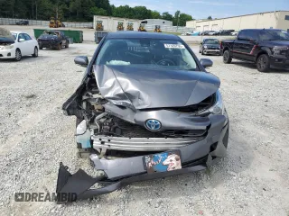 2017 Toyota Prius Two z VIN JTDKBRFU5H3036407, wystawiony jako Copart lot #57320795 z przebiegiem 69 468 mil mil oraz Szkoda całkowita • Salvage title. Historia ofert i sprzedaży dostępna na DreamBid. Obrazek 5.