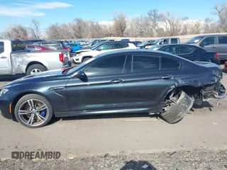 2017 BMW M6 z VIN WBS6E9C58HG437411, wystawiony jako IAAI lot #41636164 z przebiegiem 52 724 mil mil oraz . Historia ofert i sprzedaży dostępna na DreamBid. Obrazek 14.