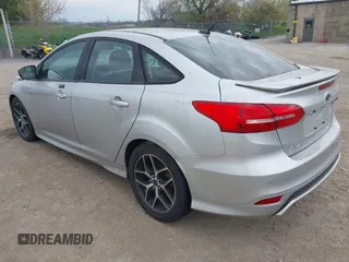2016 Ford Focus SE with VIN 1FADP3F20GL228831, listed as a IAAI auction lot 42115033 with 106,975 mi miles. Bid and sale history available at carsss.com. Image 3.
