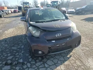 2012 Scion iQ z VIN JTNJJXB00CJ014966, wystawiony jako Copart lot #83100954 z przebiegiem 100 775 mil mil oraz Szkoda całkowita • Salvage title. Historia ofert i sprzedaży dostępna na DreamBid. Obrazek 10.