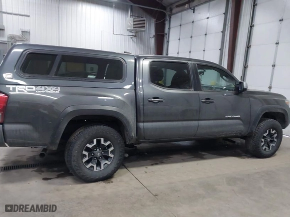 2016 Toyota Tacoma SR with VIN 3TMCZ5ANXGM038174, listed as a IAAI auction lot 41436591 with 150,997 mi miles. Bid and sale history available at carsss.com. Image 13.