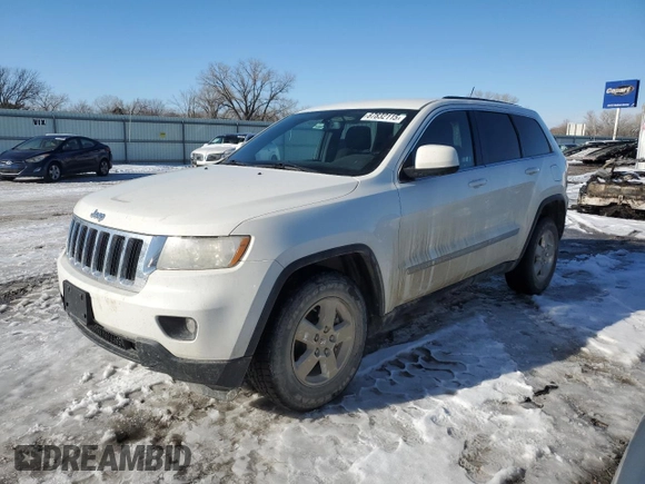 2012 Jeep Grand Cherokee Laredo with VIN 1C4RJFAG2CC267890, listed as a Copart auction lot 87832115 with 171,552 mi miles and Salvage Title. Bid and sale history available at carsss.com. Image 1.