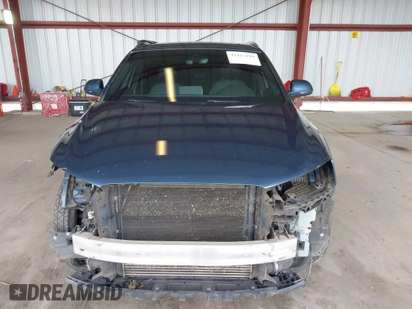 2016 Audi Q3 Prestige z VIN WA1GFCFS8GR020973, wystawiony jako IAAI lot #41923494 z przebiegiem 184 467 mil mil oraz . Historia ofert i sprzedaży dostępna na DreamBid. Obrazek 13.