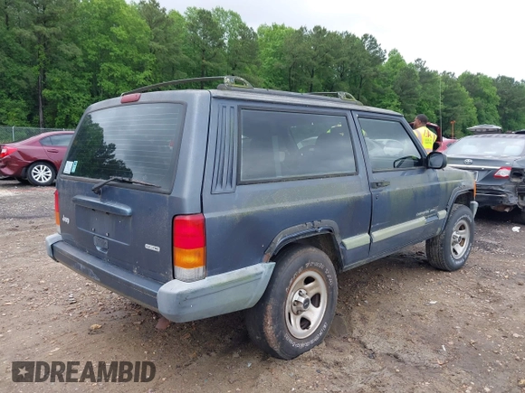 2001 Jeep Cherokee with VIN 1J4FT47S11L609530, listed as a IAAI auction lot 42222446 with 156,408 mi miles and . Bid and sale history available at DreamBid. Image 4.
