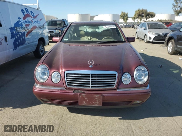 1998 Mercedes-Benz E 320 with VIN WDBJF25FXWA549962, listed as a Copart auction lot 87876005 with 303,884 mi miles and Salvage Title. Bid and sale history available at DreamBid. Image 5.