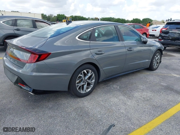 2023 Hyundai Sonata SEL with VIN KMHL64JA0PA270047, listed as a IAAI auction lot 42022365 with 57,904 mi miles. Bid and sale history available at carsss.com. Image 4.