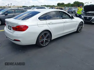 2018 BMW 4 Series 430i with VIN WBA4J1C5XJBG78451, listed as a IAAI auction lot 42256036 with 103,289 mi miles and . Bid and sale history available at DreamBid. Image 4.