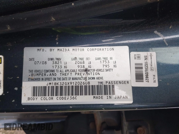 2009 Mazda Mazda3 i Touring Value with VIN JM1BK32GX91202608, listed as a IAAI auction lot 41867058 with 204,978 mi miles. Bid and sale history available at carsss.com. Image 9.