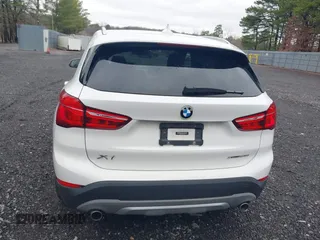 2018 BMW X1 xDrive28i with VIN WBXHT3C36J5L32162, listed as a IAAI auction lot 41802315 with 80,422 mi miles. Bid and sale history available at carsss.com. Image 16.