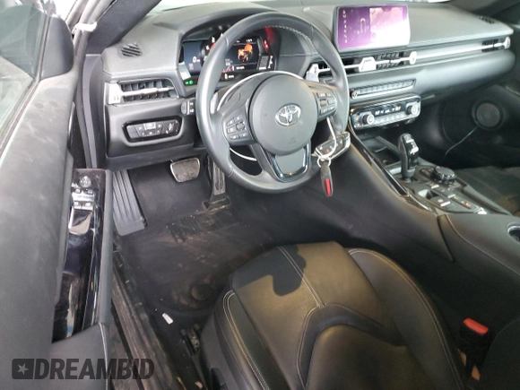 2021 Toyota GR Supra 3.0 with VIN WZ1DB0C09MW036216, listed as a Copart auction lot 86403444 with 14,800 mi miles and Salvage Title. Bid and sale history available at carsss.com. Image 8.