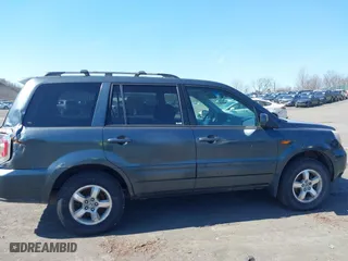 2006 Honda Pilot EX-L with RES with VIN 2HKYF18646H501940, listed as a IAAI auction lot 41714893 with 353,448 mi miles. Bid and sale history available at carsss.com. Image 6.