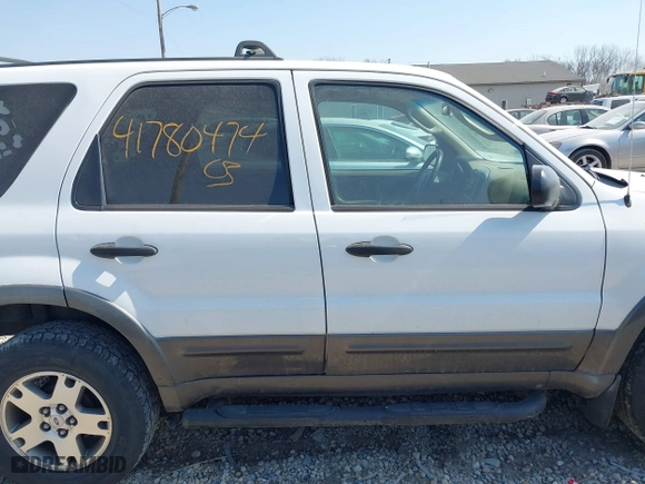 2004 Ford Escape XLT with VIN 1FMYU93164KA96674, listed as a IAAI auction lot 41780474 with 182,525 mi miles. Bid and sale history available at carsss.com. Image 13.