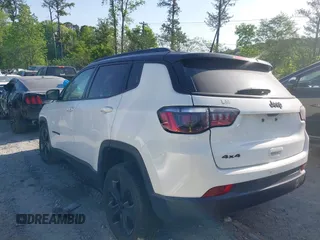 2021 Jeep Compass Altitude with VIN 3C4NJDBB2MT596181, listed as a IAAI auction lot 42026716 with 69,526 mi miles and . Bid and sale history available at DreamBid. Image 14.