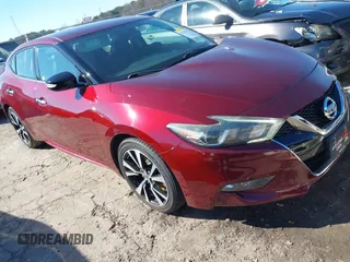 2018 Nissan Maxima Platinum z VIN 1N4AA6AP8JC409949, wystawiony jako IAAI lot #41581213 z przebiegiem 77 655 mil mil oraz . Historia ofert i sprzedaży dostępna na DreamBid. Obrazek 1.