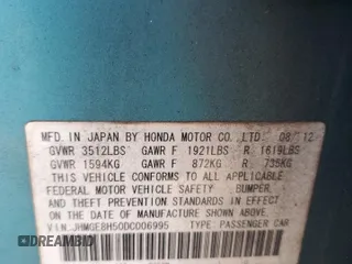2013 Honda Fit Sport z VIN JHMGE8H50DC006995, wystawiony jako Copart lot #58854875 z przebiegiem 78 207 mil mil oraz Szkoda całkowita • Salvage title. Historia ofert i sprzedaży dostępna na DreamBid. Obrazek 13.