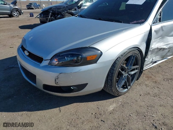 2014 Chevrolet Impala Limited LTZ with VIN 2G1WC5E33E1102480, listed as a IAAI auction lot 41666058 with 113,307 mi miles. Bid and sale history available at carsss.com. Image 6.
